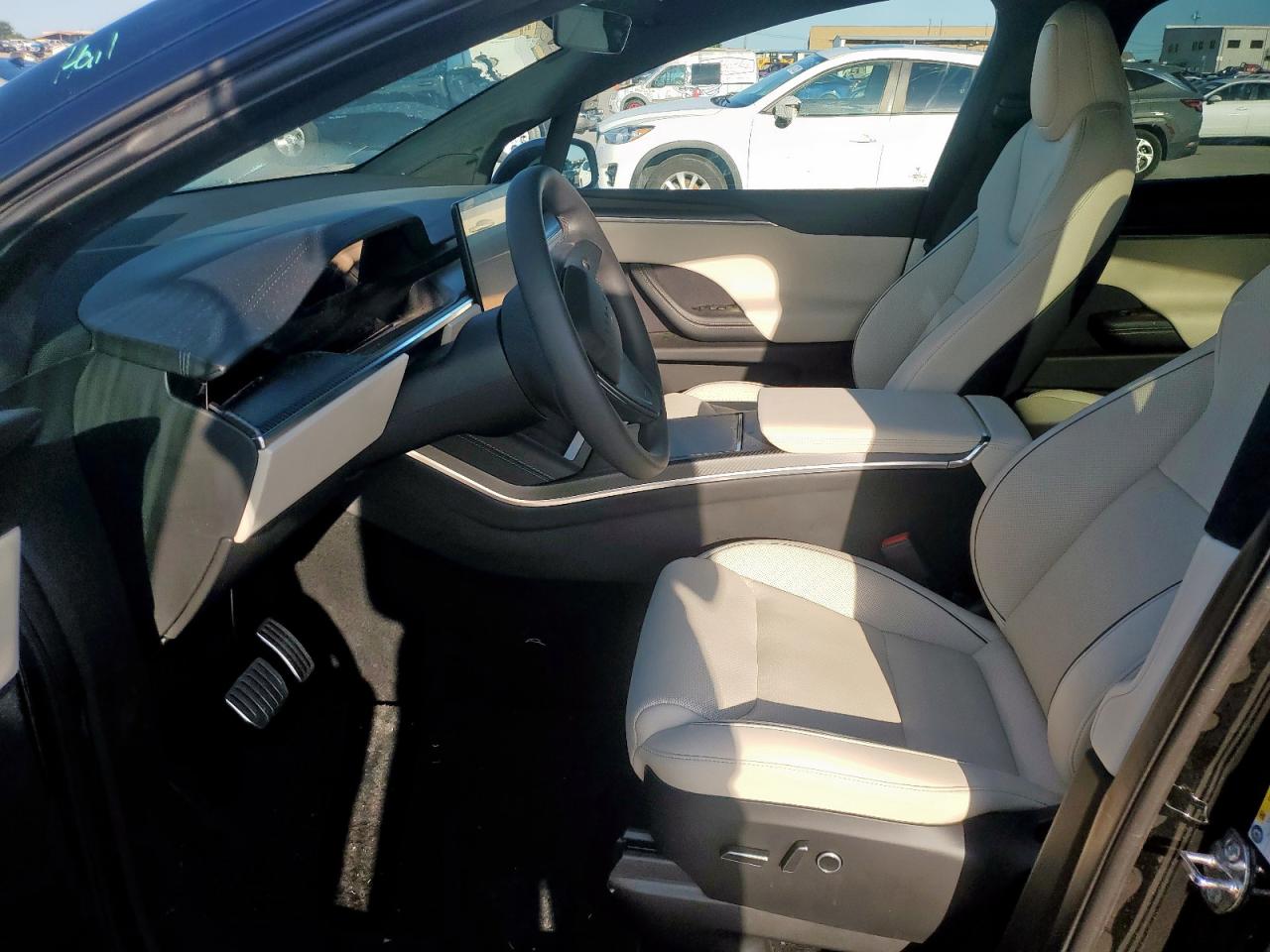 2023 Tesla Model X VIN: 7SAXCBE60PF411282 Lot: 61056975