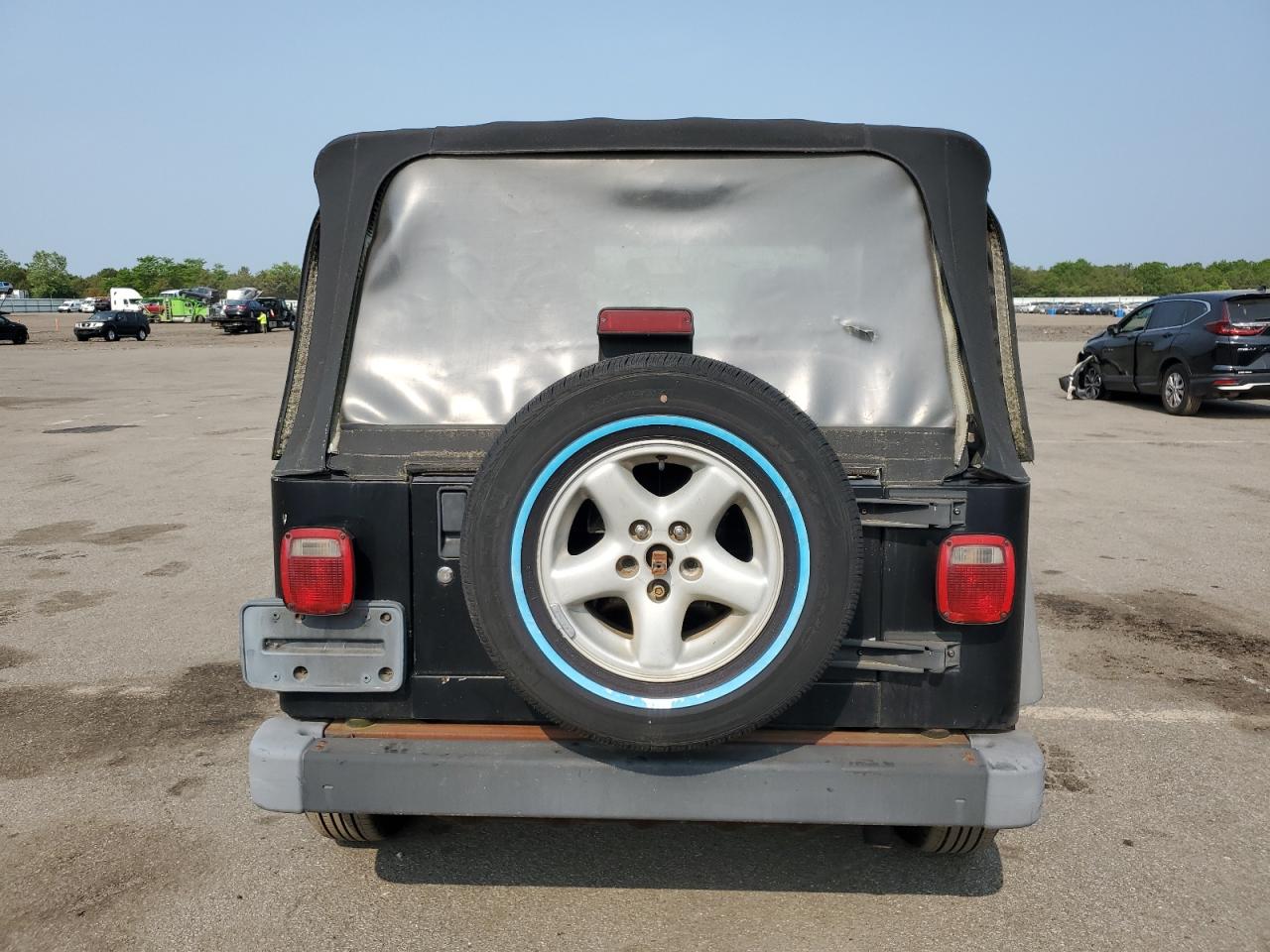 2003 Jeep Wrangler Commando VIN: 1J4FA39S23P359983 Lot: 59469005