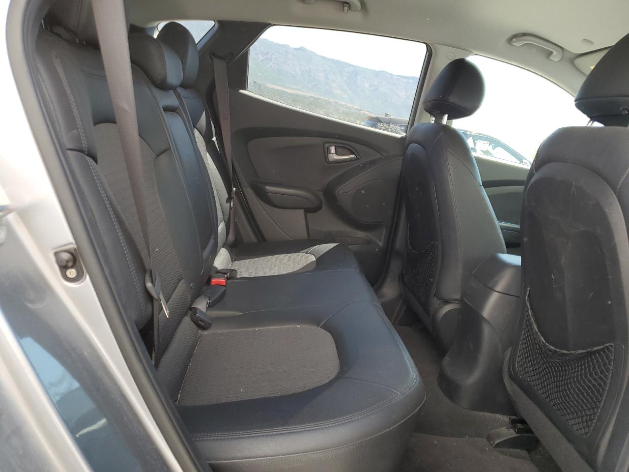 HYUNDAI TUCSON 2012 VIN KM8JUCACXCU542525 фото 11