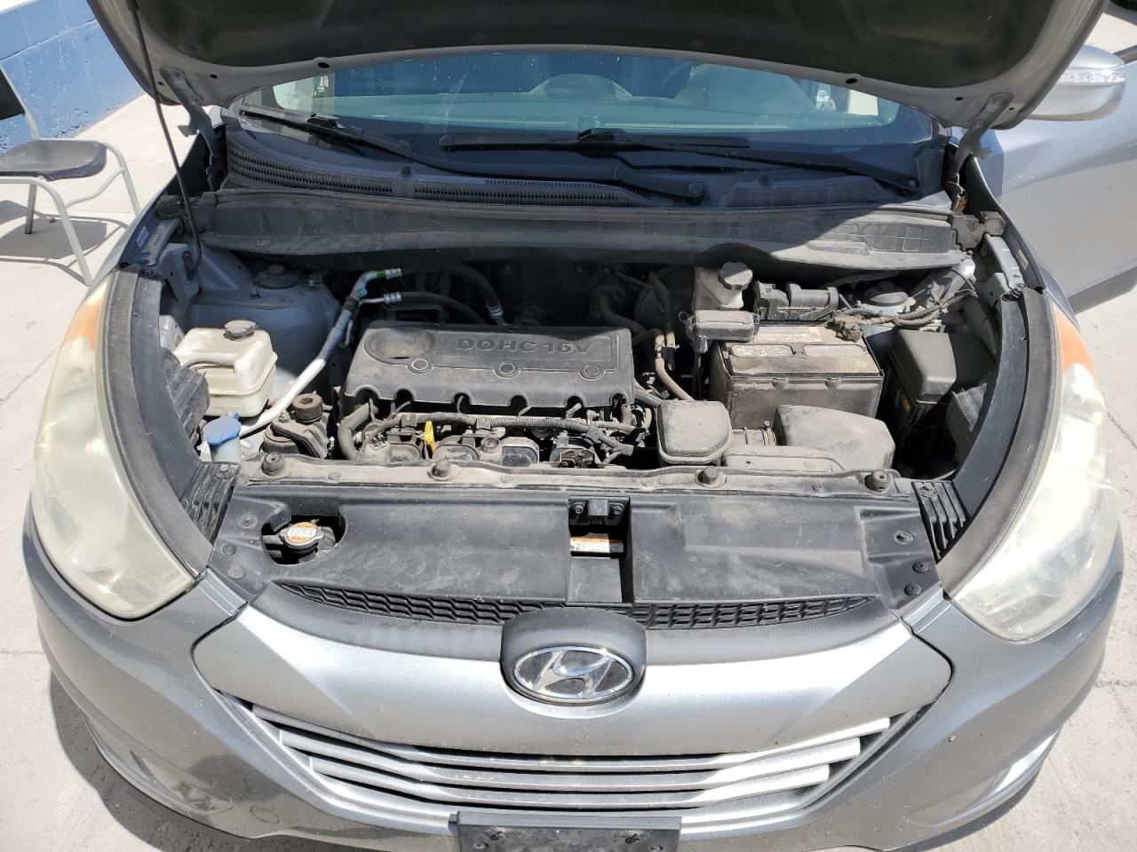 HYUNDAI TUCSON 2012 VIN KM8JUCACXCU542525 фото 12