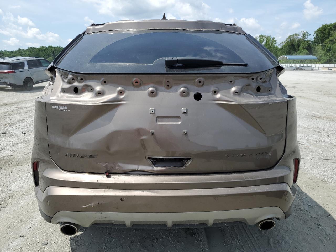 2019 Ford Edge Titanium VIN: 2FMPK3K98KBC25303 Lot: 61194505