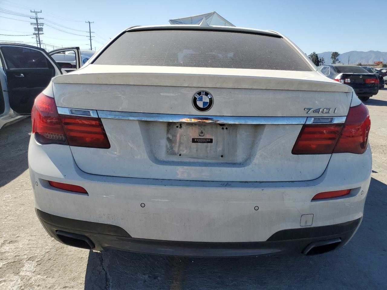 2014 BMW 740 I VIN: WBAYA6C50ED144560 Lot: 61612265