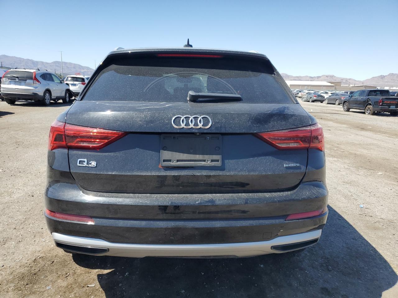 2020 Audi Q3 Premium VIN: WA1AECF32L1026309 Lot: 61504005