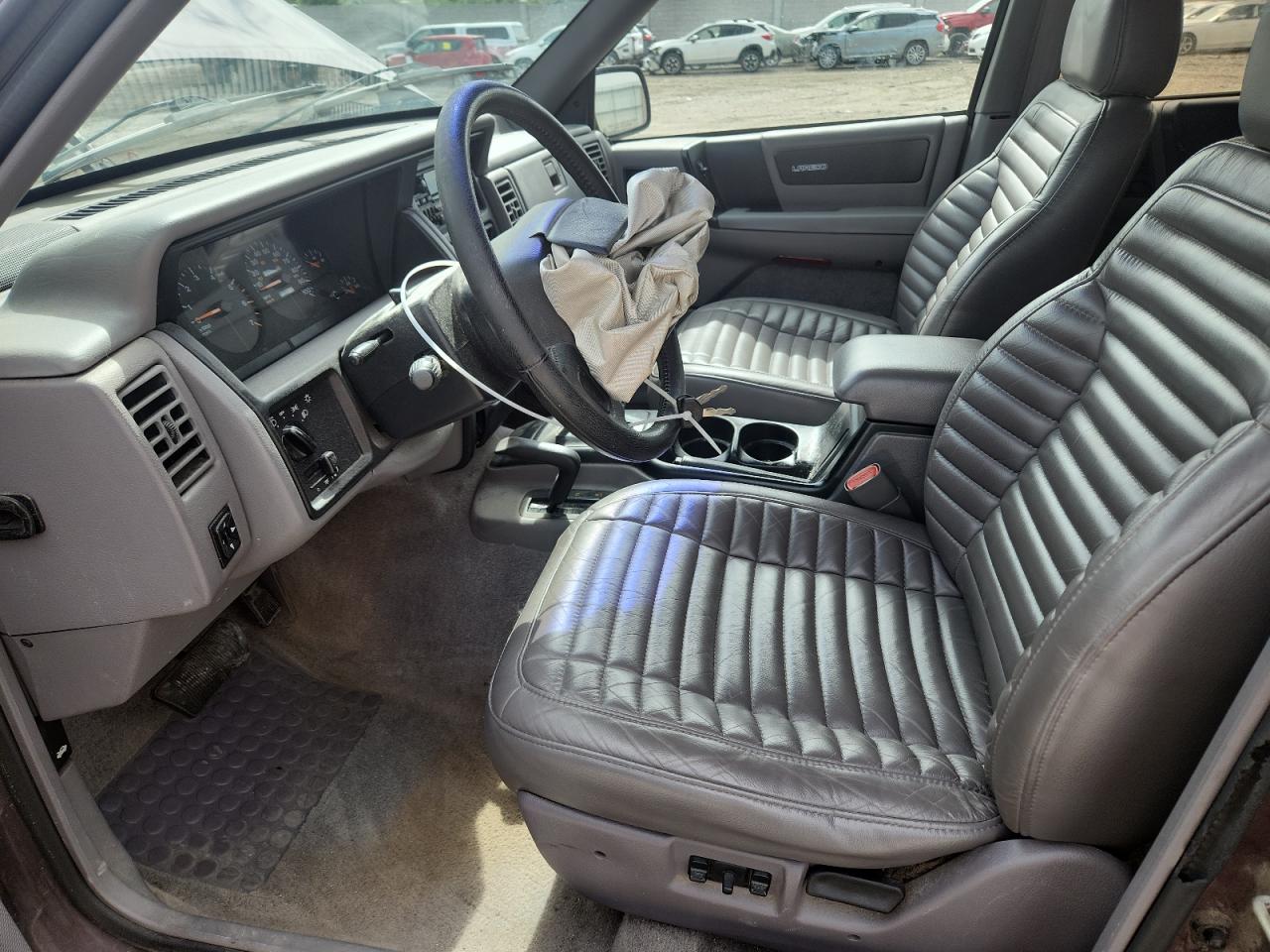 1994 Jeep Grand Cherokee Laredo VIN: 1J4GZ58S0RC221854 Lot: 61950825