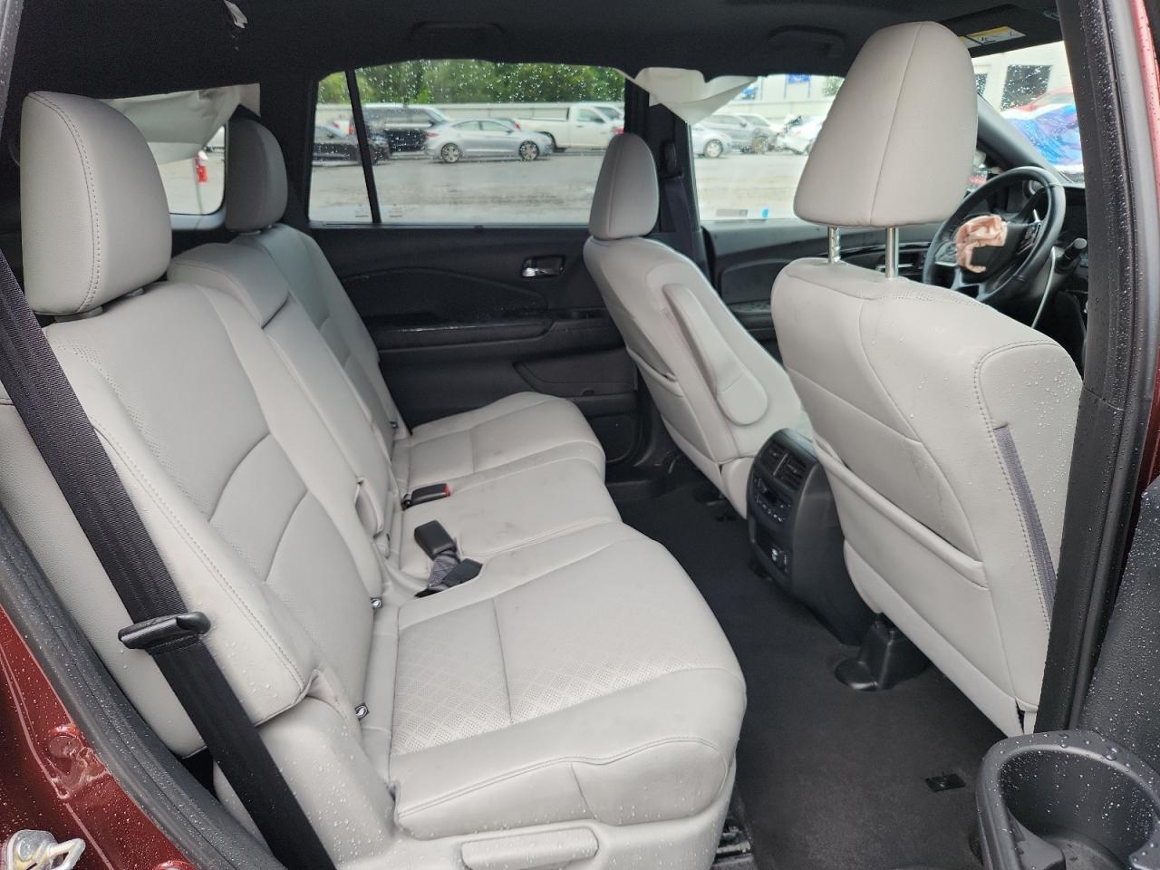 2021 Honda Passport Elite VIN: 5FNYF8H07MB002713 Lot: 64270625