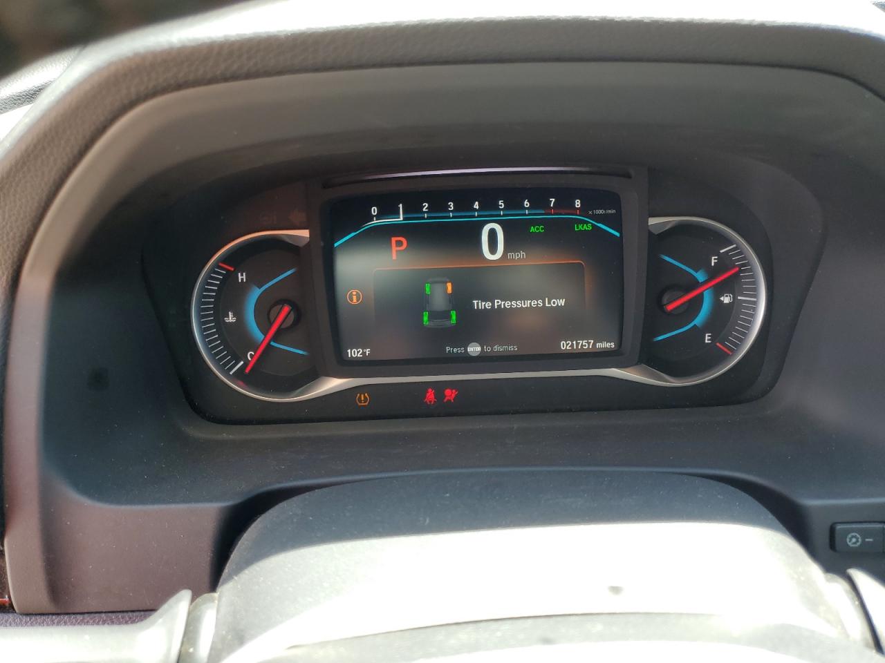 2021 Honda Passport Elite VIN: 5FNYF8H03MB007617 Lot: 63036345