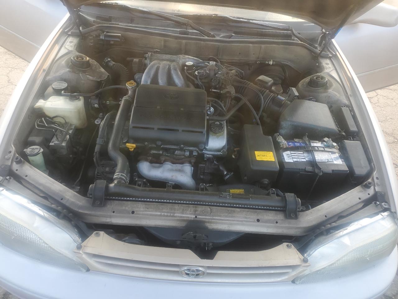 1995 Toyota Camry Le VIN: 4T1GK12CXSU067735 Lot: 58879205