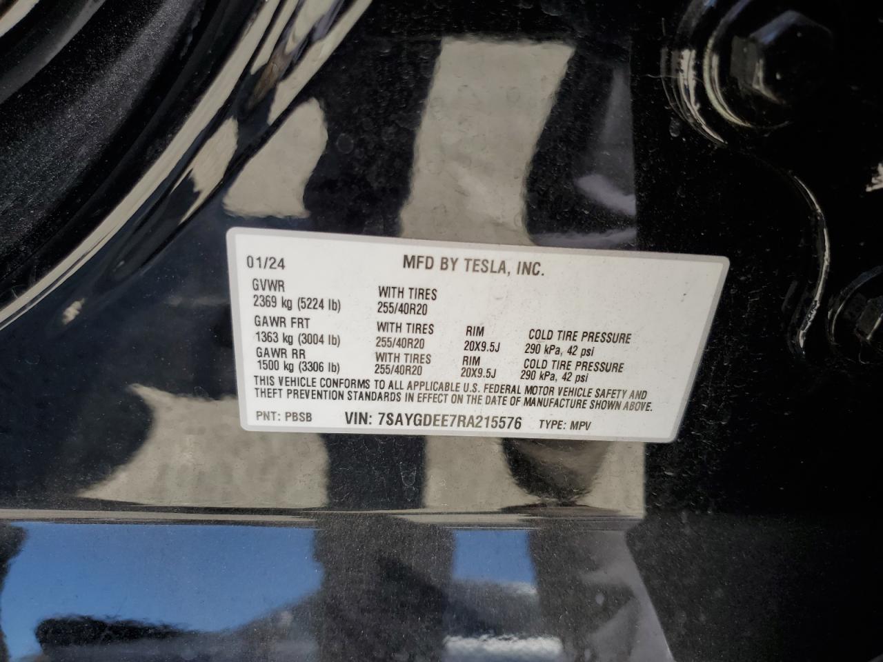 2024 Tesla Model Y VIN: 7SAYGDEE7RA215576 Lot: 63054895