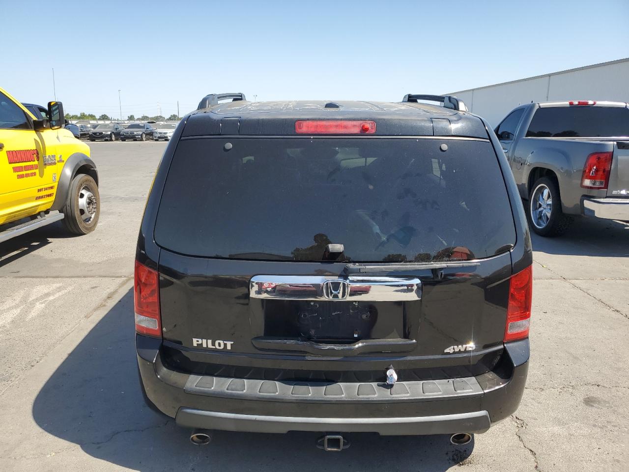 2011 Honda Pilot Exln VIN: 5FNYF4H74BB010433 Lot: 63043845
