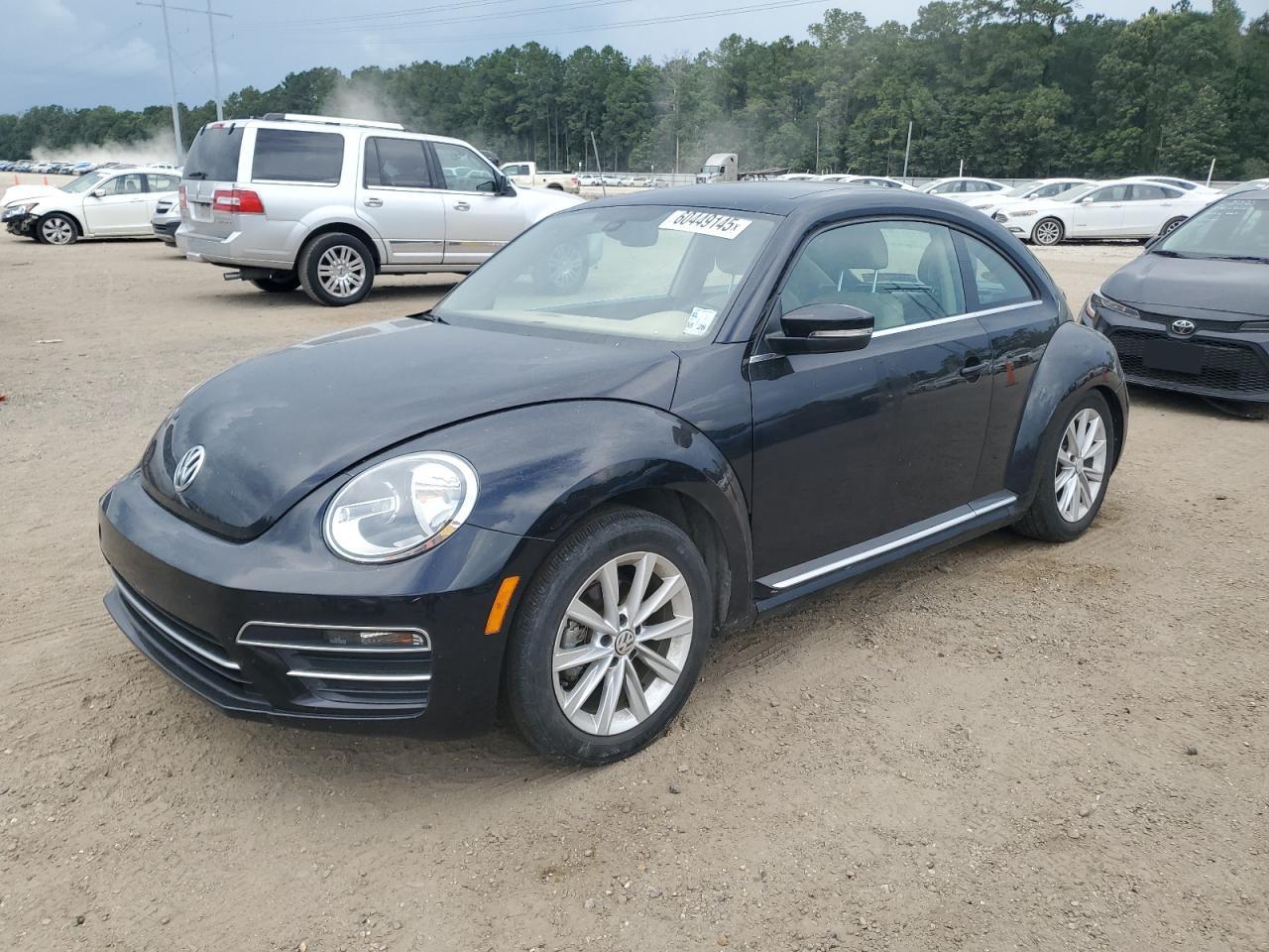 2018 Volkswagen Beetle Se black null gas 3VWJD7AT6JM710252 photo #1