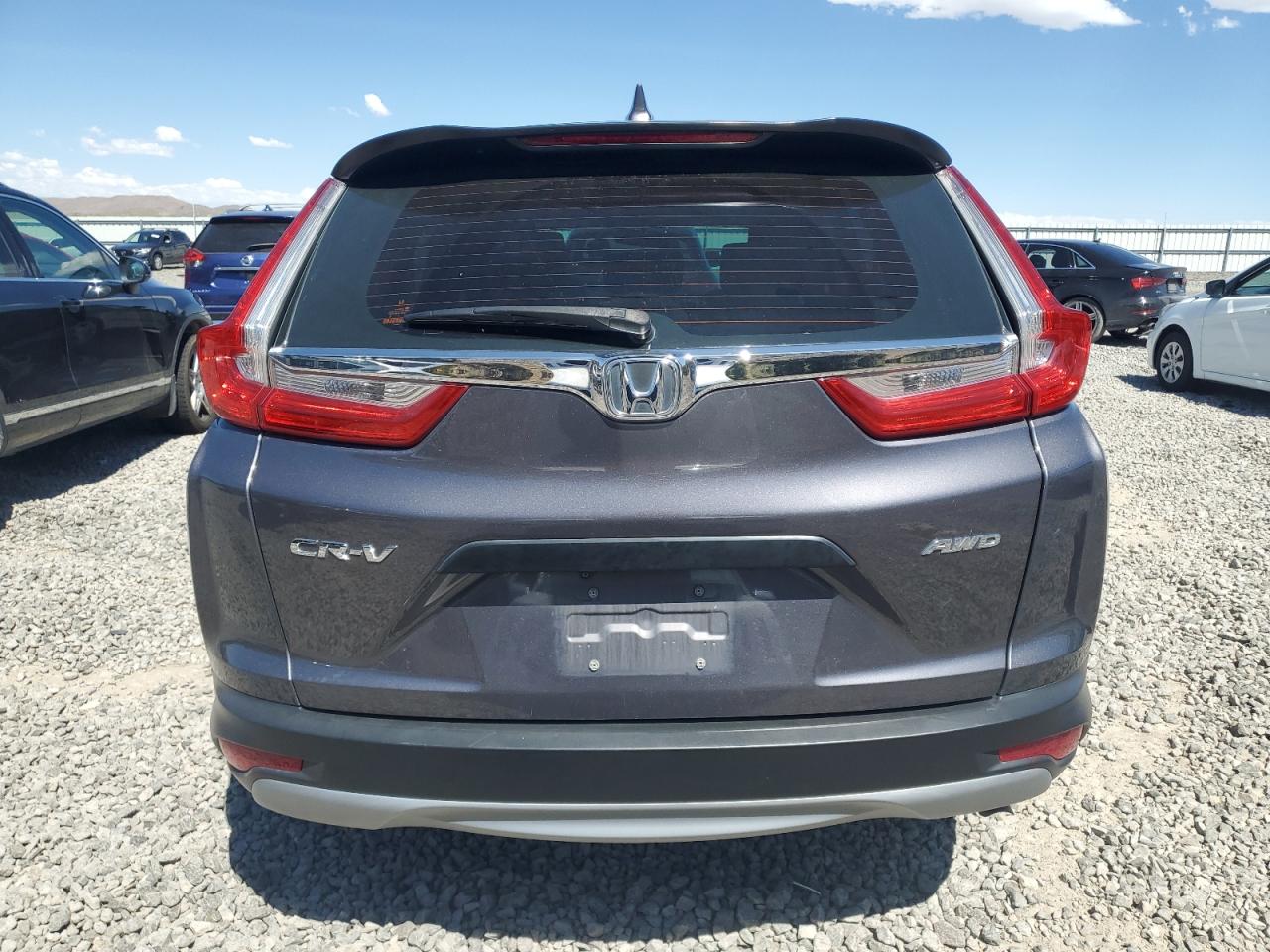 2017 Honda Cr-V Lx VIN: 2HKRW6H39HH210828 Lot: 61424465