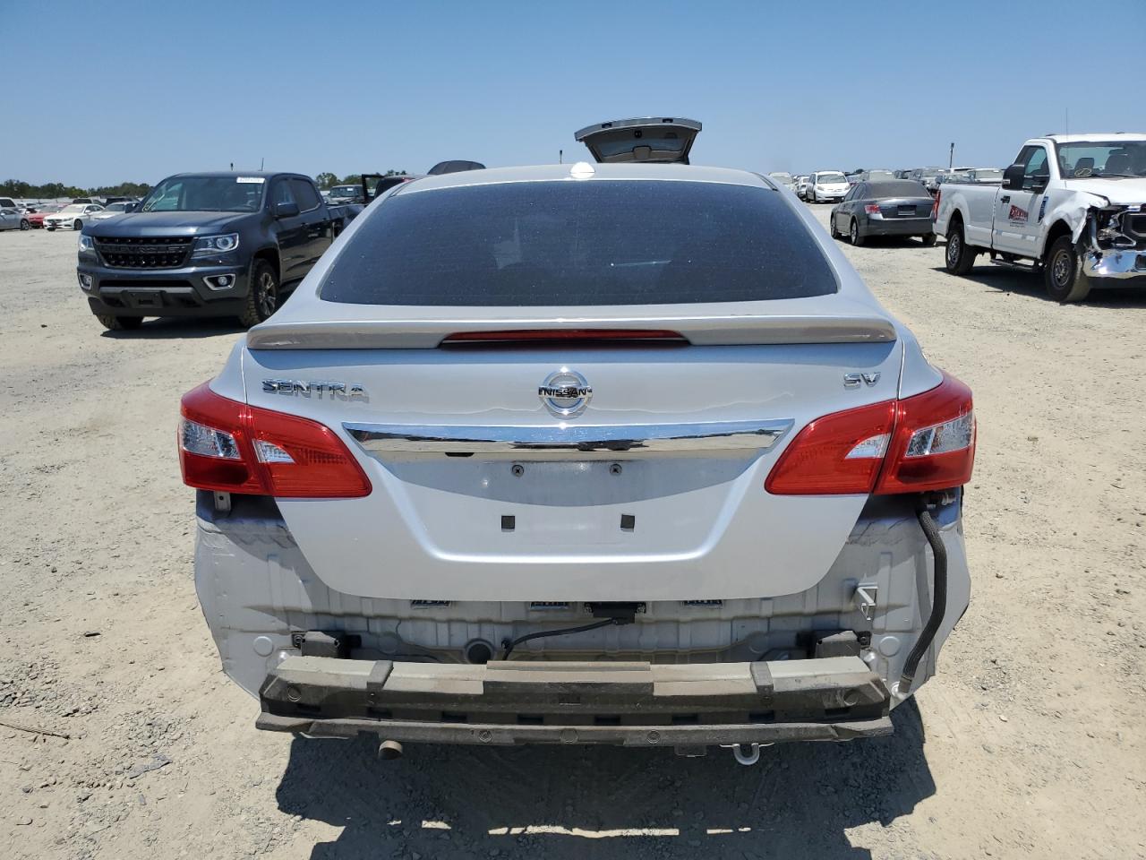2019 Nissan Sentra S VIN: 3N1AB7APXKL614520 Lot: 63028885