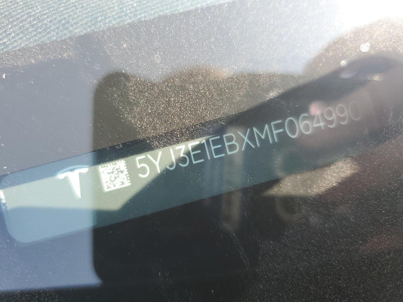 2021 Tesla Model 3 VIN: 5YJ3E1EBXMF064990 Lot: 60661055