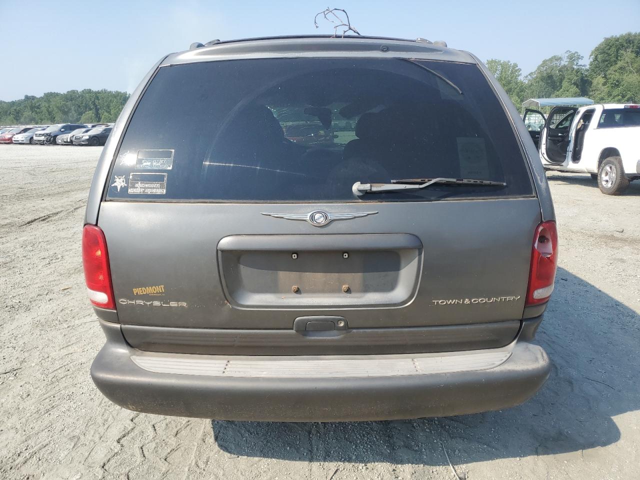 1999 Chrysler Town & Country Limited VIN: 1C4GP64L5XB594259 Lot: 61962315