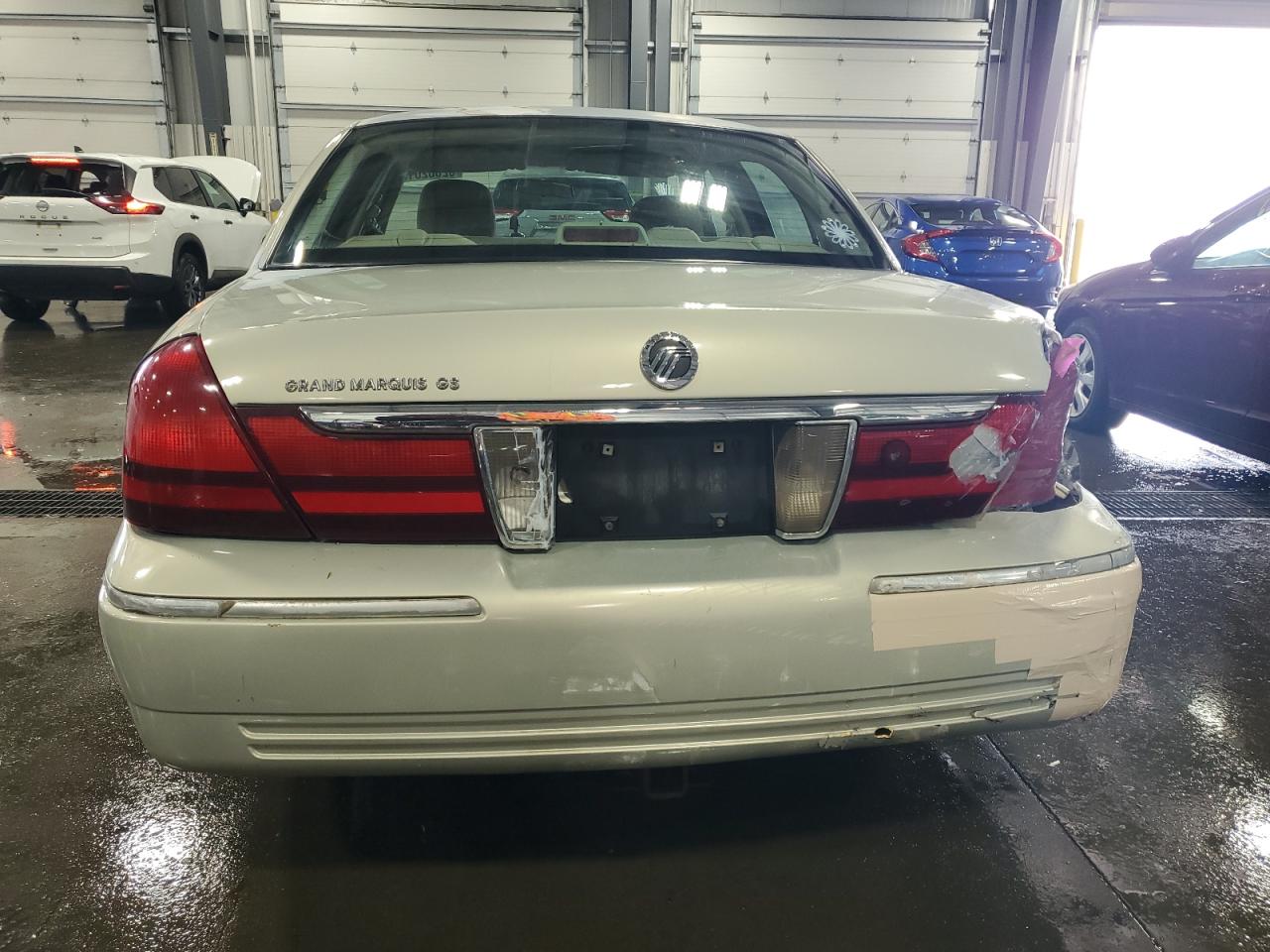 2004 Mercury Grand Marquis Gs VIN: 2MEFM74W34X681685 Lot: 62662015