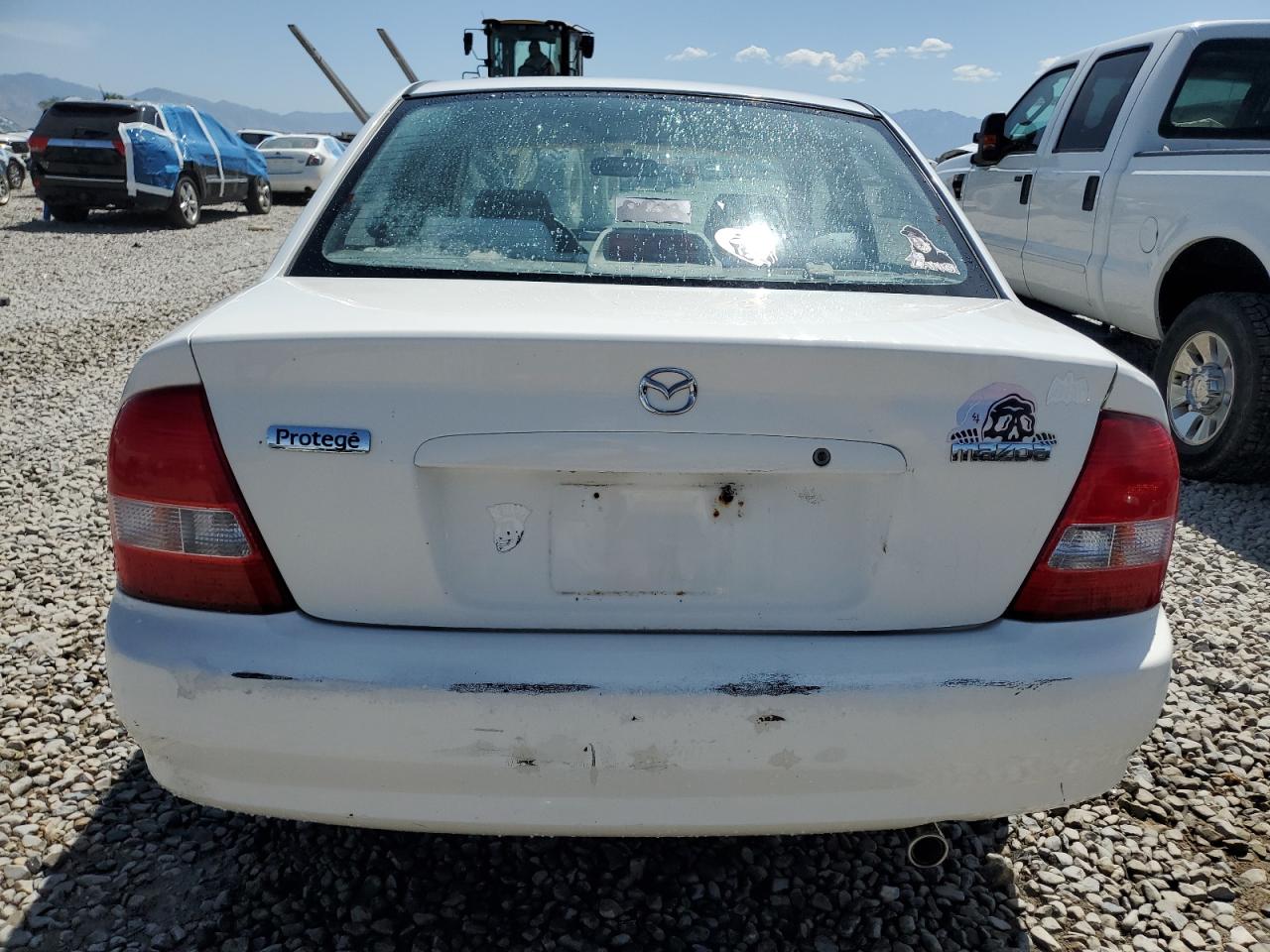 2000 Mazda Protege Dx VIN: JM1BJ2224Y0203582 Lot: 62561055