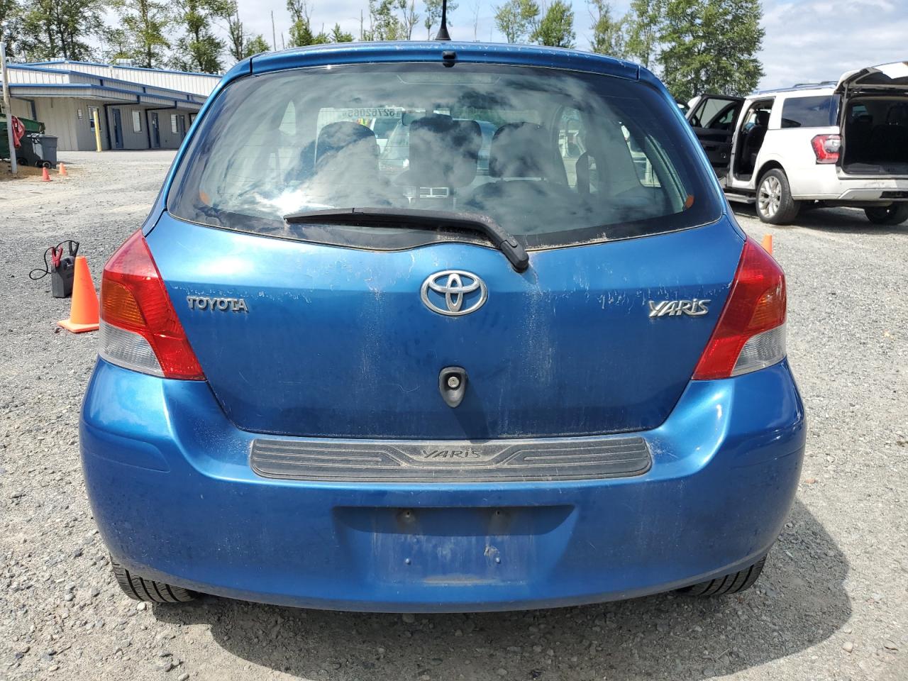 2009 Toyota Yaris VIN: JTDJT903X95244555 Lot: 62762065