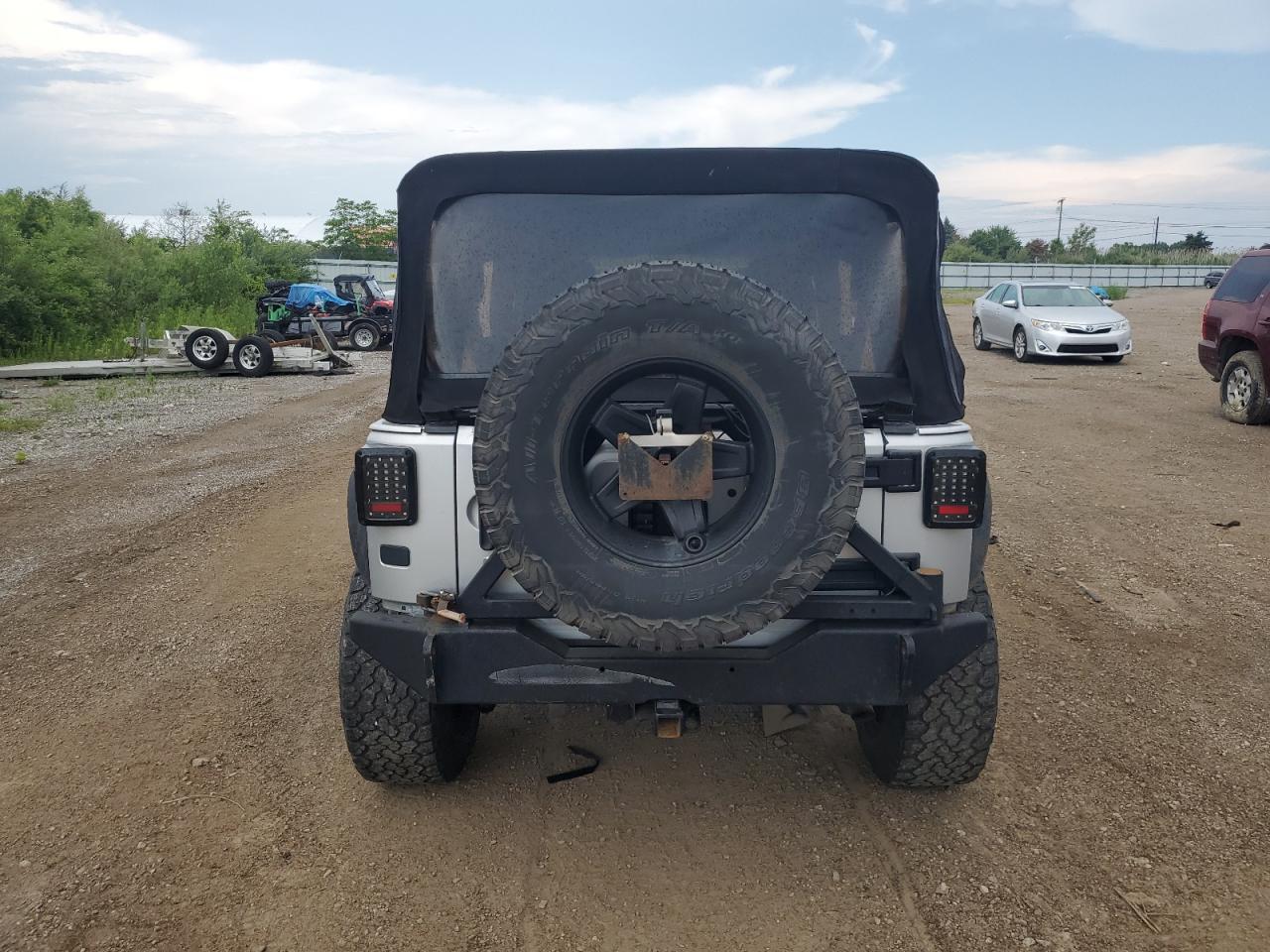 2012 Jeep Wrangler Unlimited Sport VIN: 1C4BJWDG7CL112989 Lot: 62634715