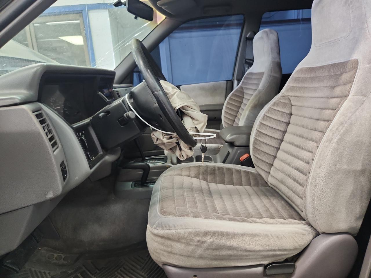 1995 Jeep Grand Cherokee Laredo VIN: 1J4GZ58S9SC695100 Lot: 59295075