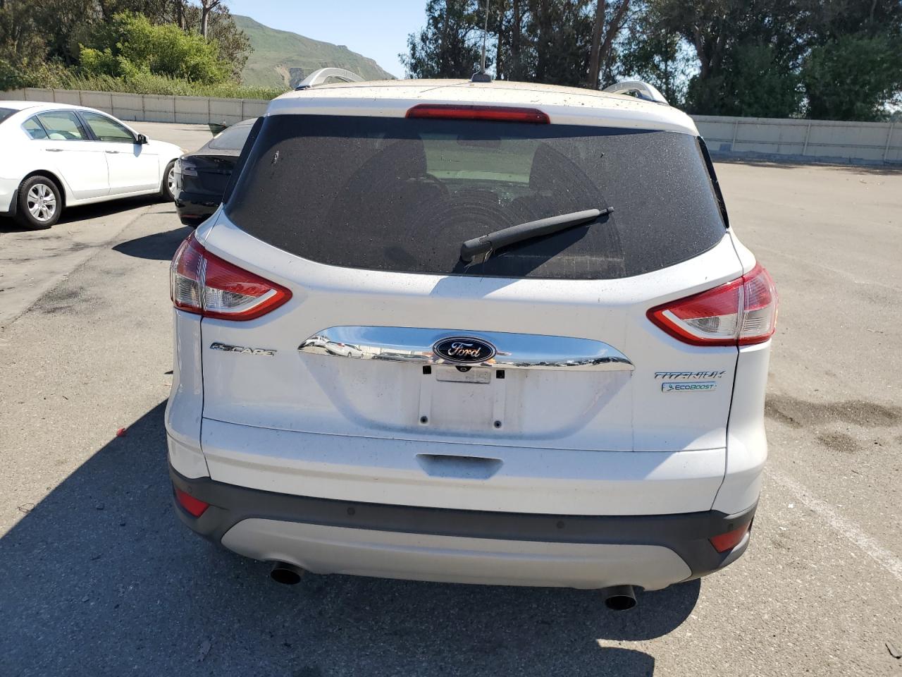 2014 Ford Escape Titanium VIN: 1FMCU0J9XEUD31792 Lot: 58696873