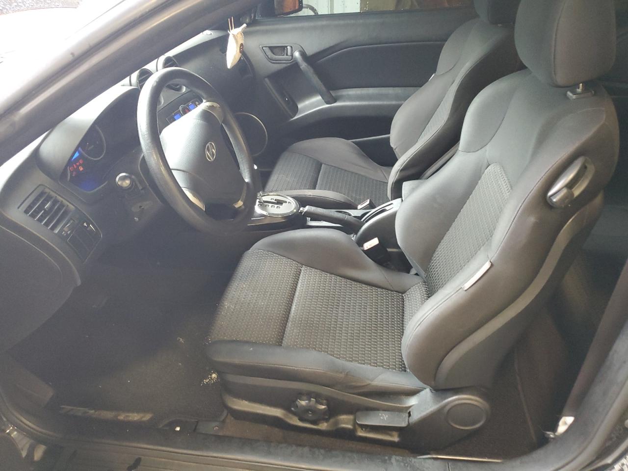 2008 Hyundai Tiburon Gs VIN: KMHHM66DX8U295595 Lot: 58099204