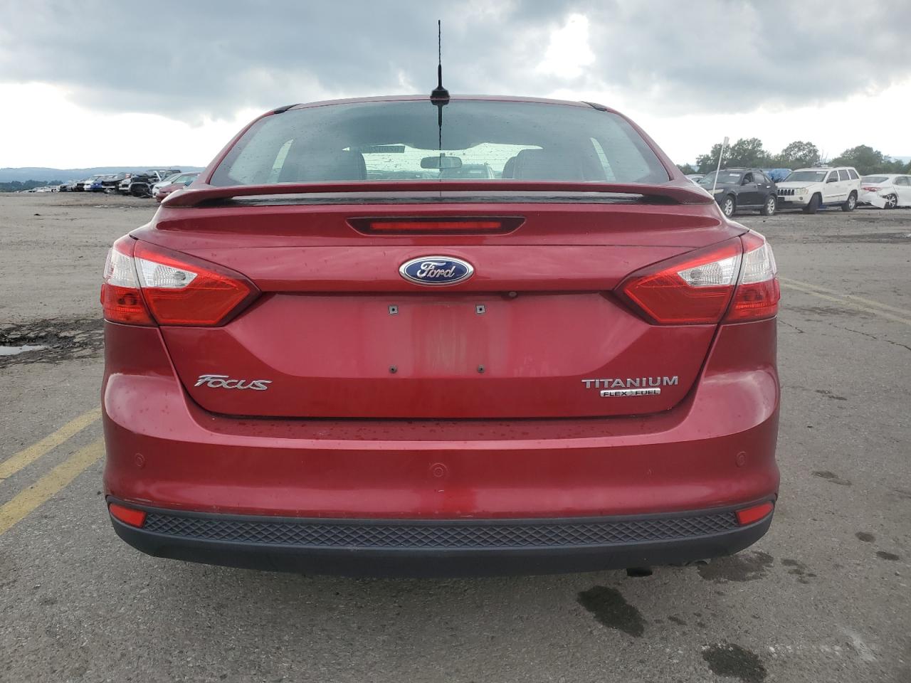 2014 Ford Focus Titanium VIN: 1FADP3J23EL183985 Lot: 62602864