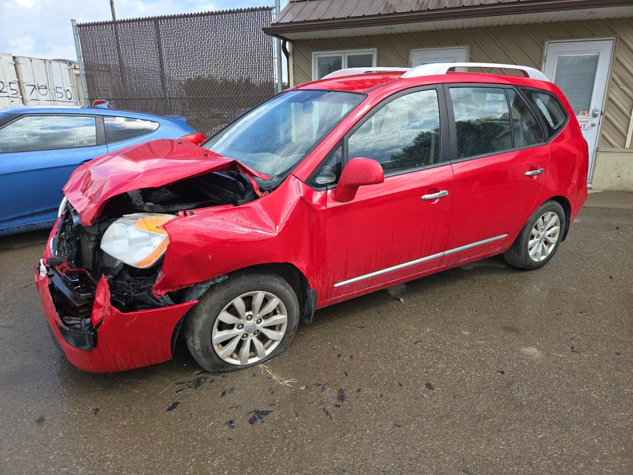 2012 Kia Rondo VIN: KNAHH8A89C7402977 Lot: 62392524