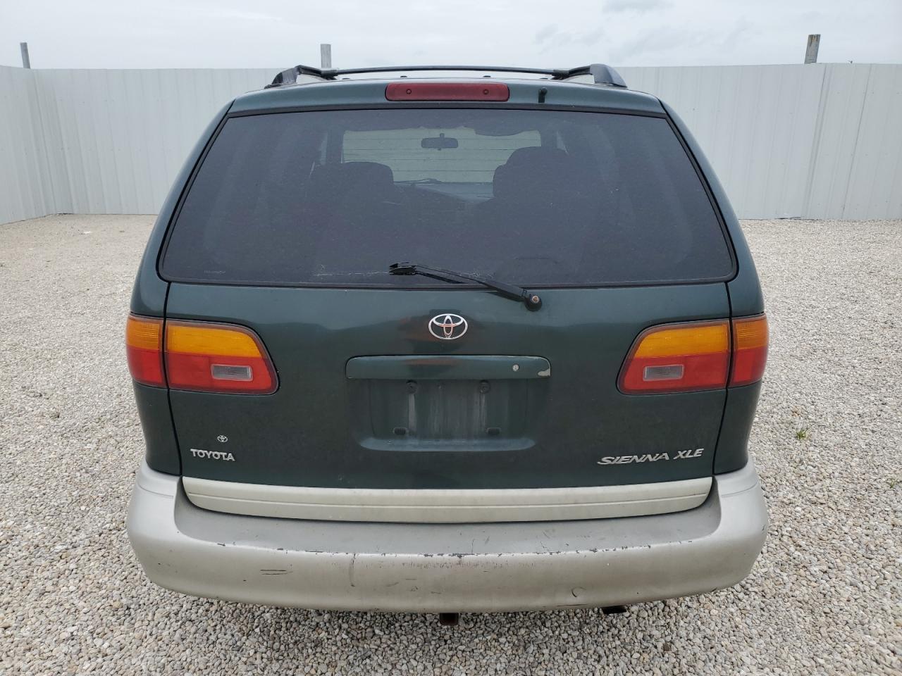 2000 Toyota Sienna Le VIN: 4T3ZF13C3YU277329 Lot: 62873394