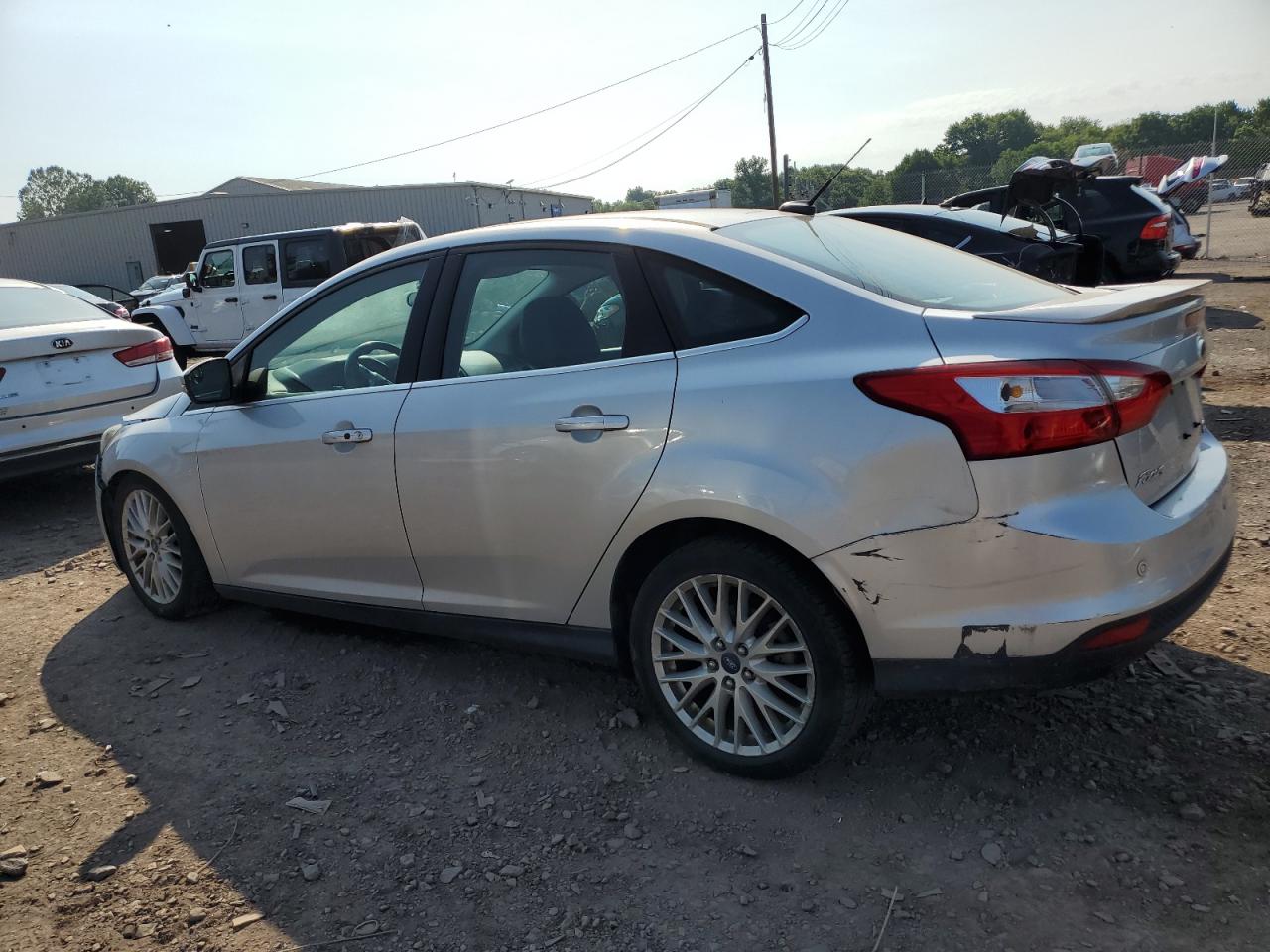 2013 Ford Focus Titanium VIN: 1FADP3J20DL120468 Lot: 62668874