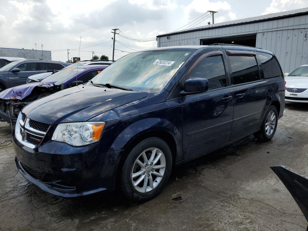 2014 Dodge Caravan - Image 1
