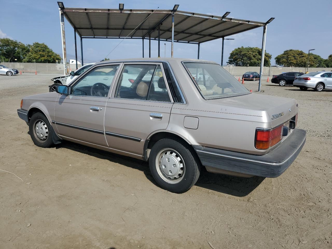 1987 Mazda 323 VIN: JM1BF2224H0557992 Lot: 63936874