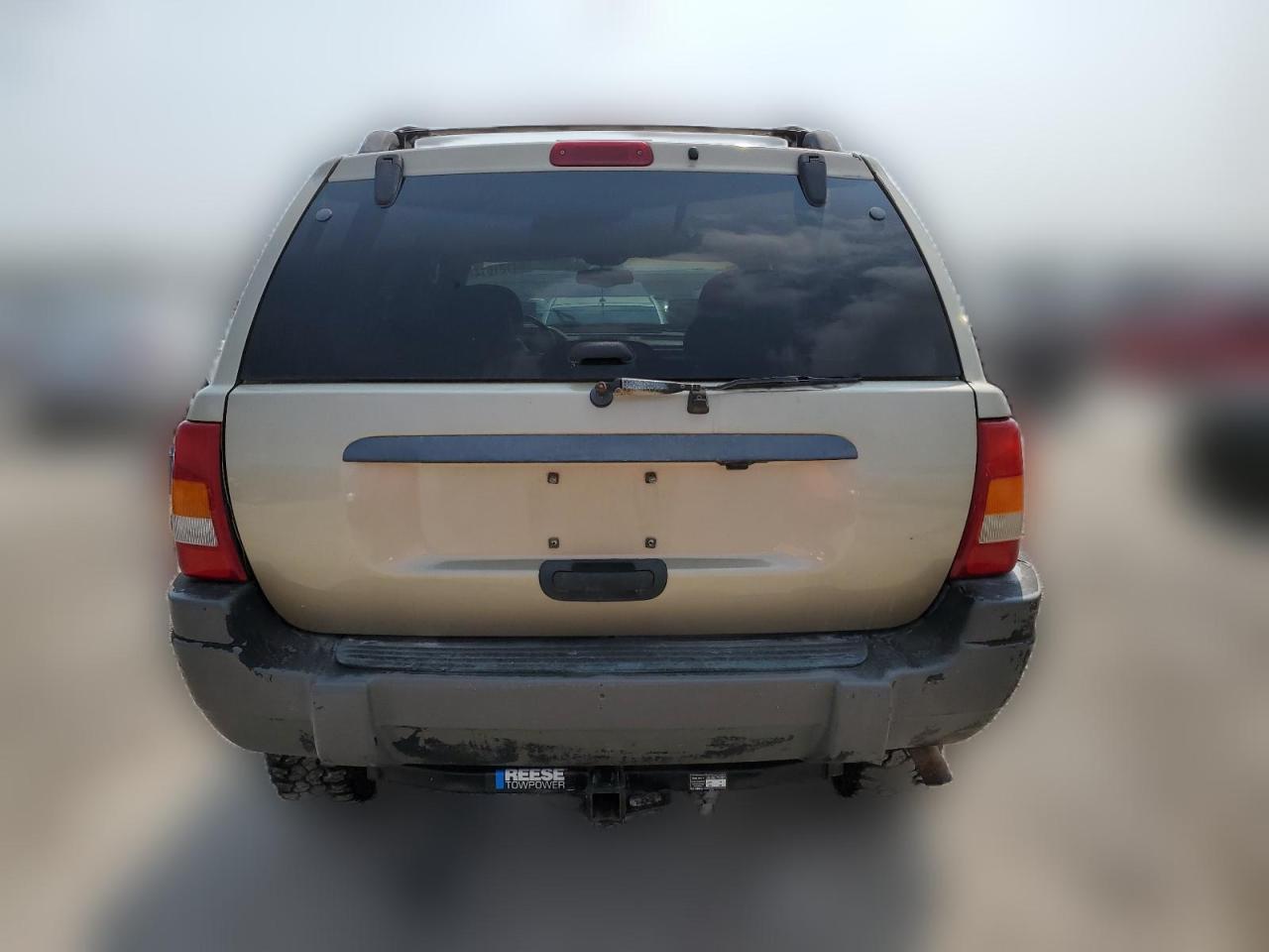 2000 Jeep Grand Cherokee Laredo VIN: 1J4GW48S3YC418132 Lot: 64121014