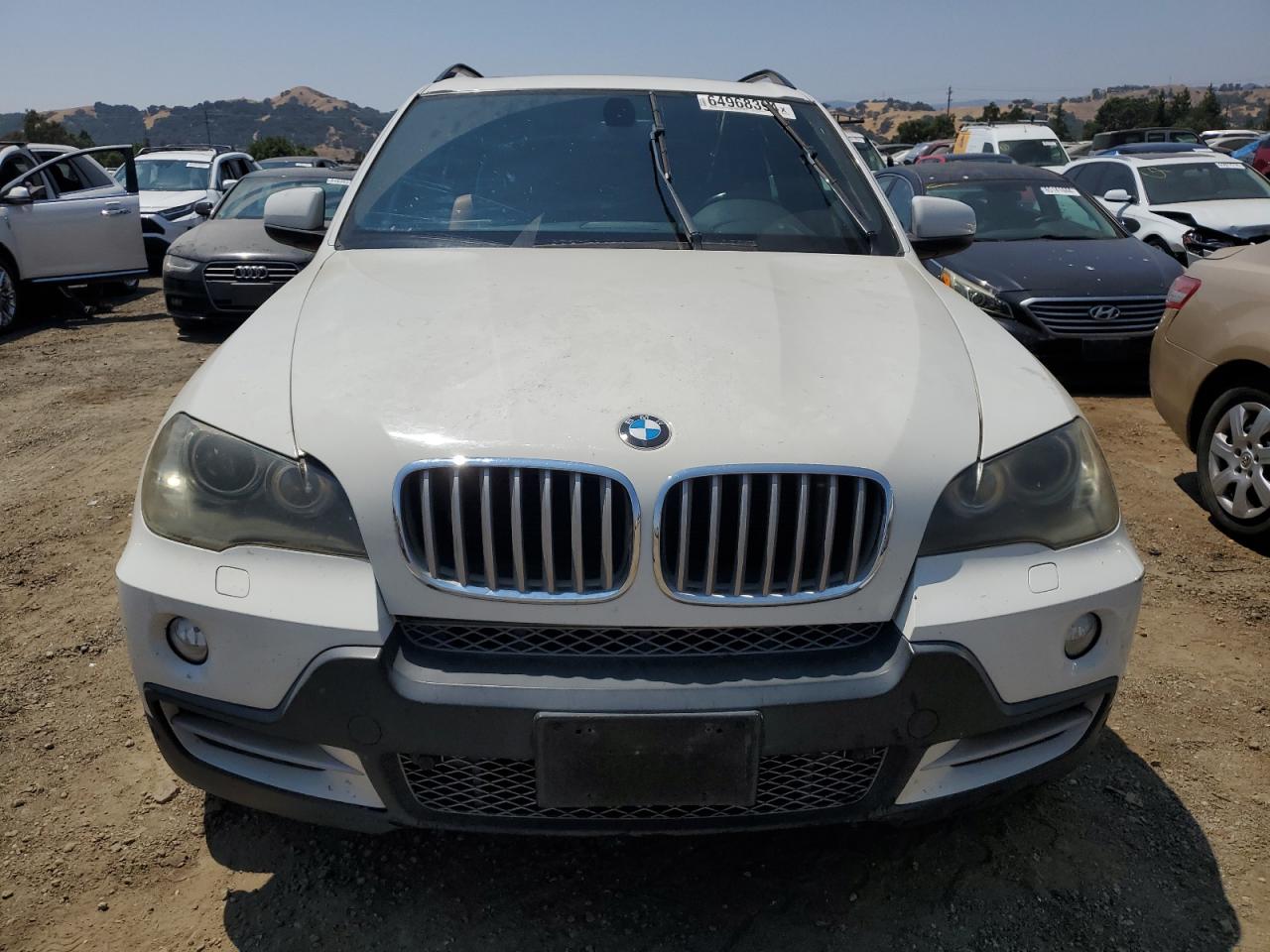 5UXFF0C55ALT77518 BMW X5 2010. Фото: 4