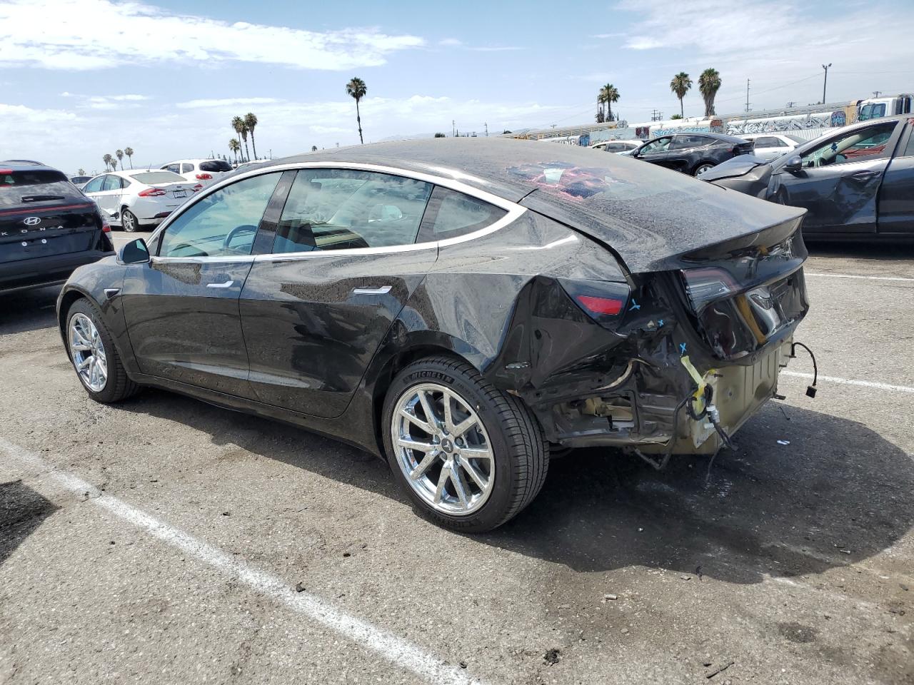 2019 Tesla Model 3 VIN: 5YJ3E1EA6KF323818 Lot: 63625594