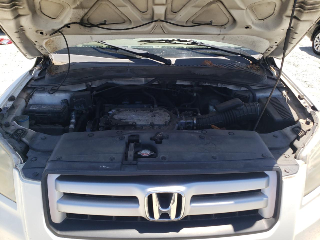 2007 Honda Pilot Lx VIN: 5FNYF28107B040469 Lot: 63233234