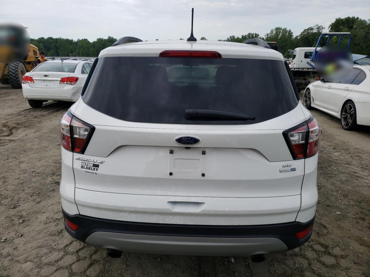 2018 Ford Escape Se VIN: 1FMCU9GD0JUB23396 Lot: 63620294