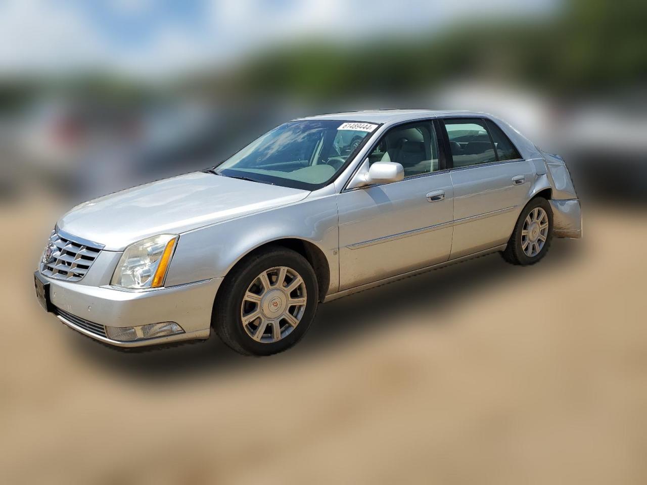 2009 Cadillac Dts VIN: 1G6KD57Y59U116552 Lot: 61489444