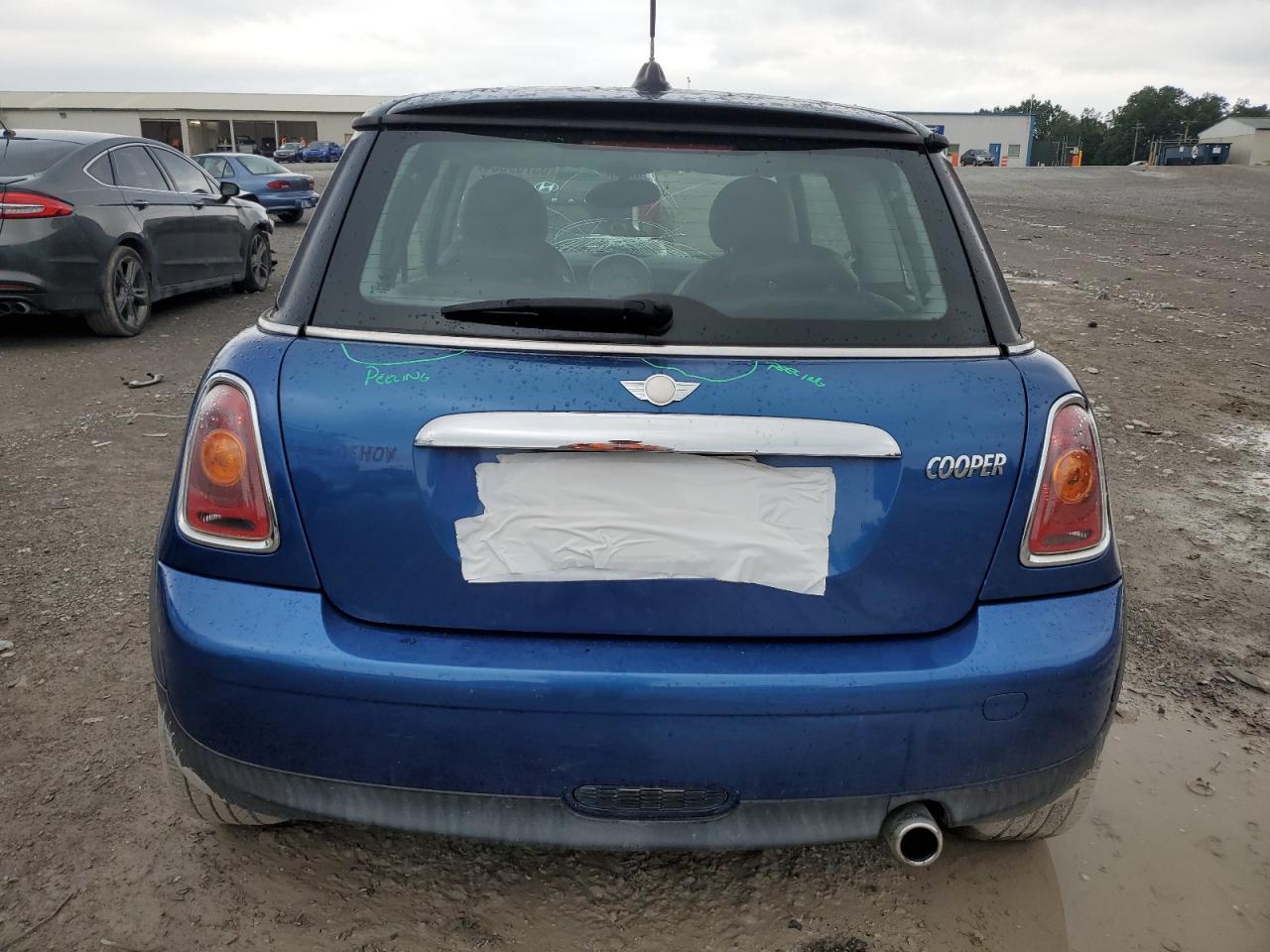 2007 Mini Cooper VIN: WMWMF33507TL68077 Lot: 63709684