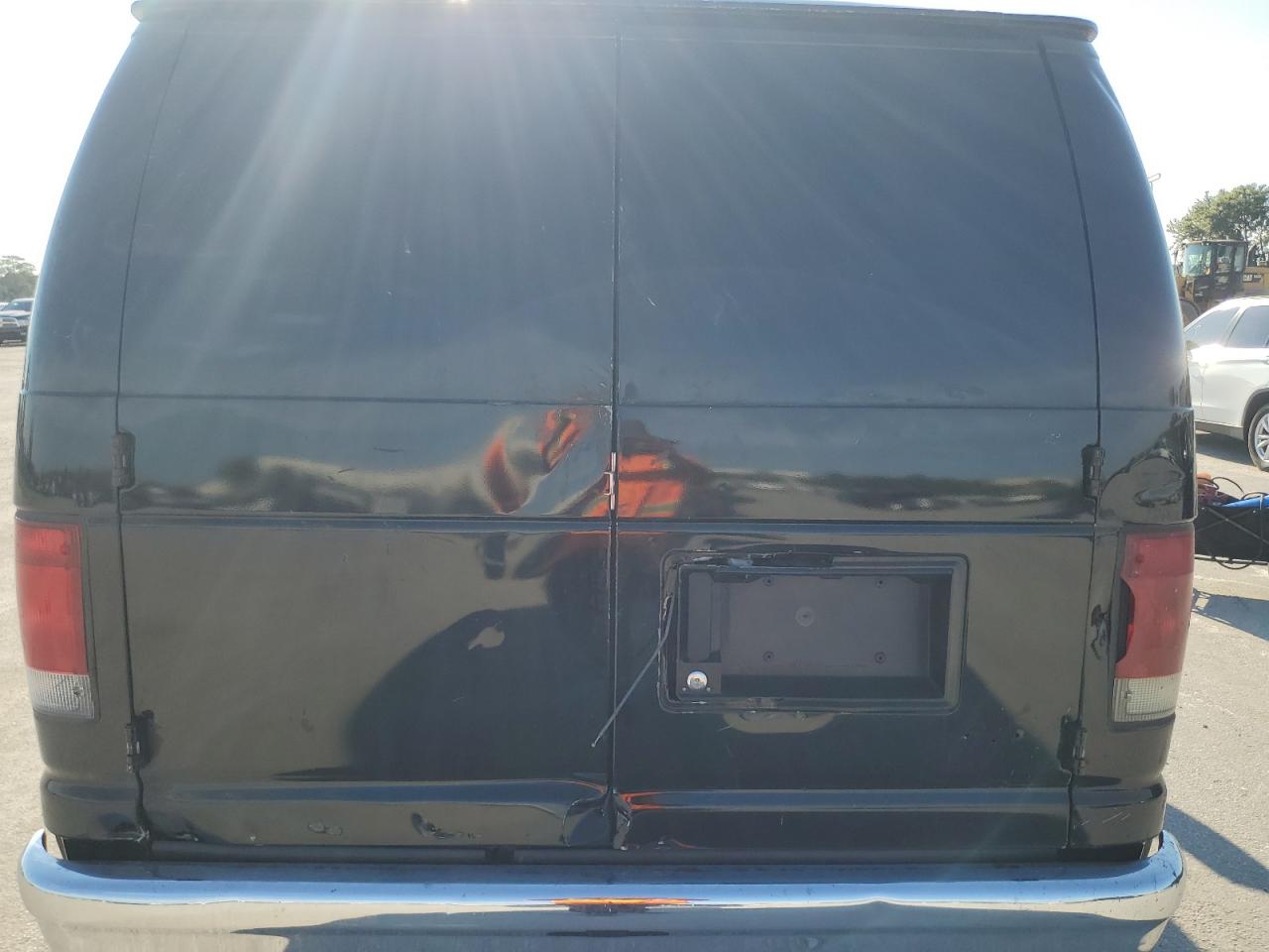 2014 Ford Econoline E150 Van VIN: 1FTNE1EW2EDA75986 Lot: 63009544