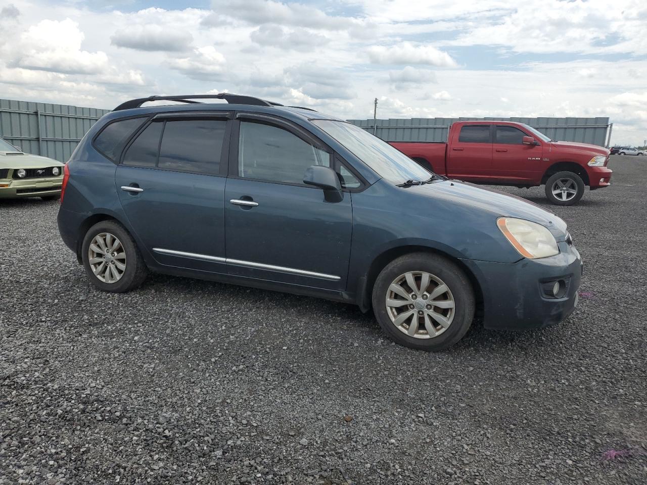 2009 Kia Rondo Base VIN: KNAFG528197293253 Lot: 63606024