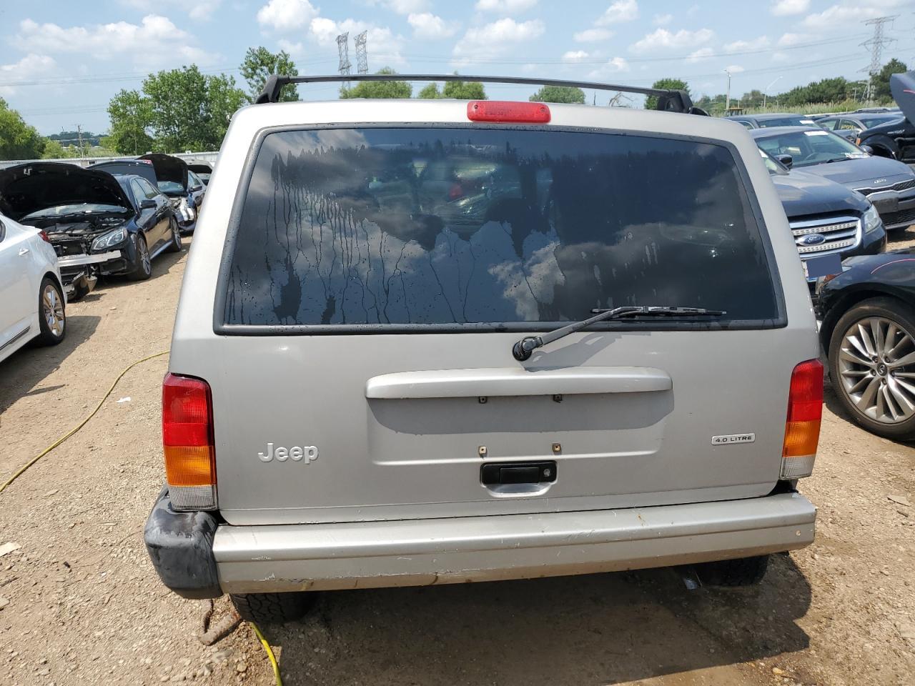 2001 Jeep Cherokee Sport VIN: 1J4FF48S31L573054 Lot: 62345104