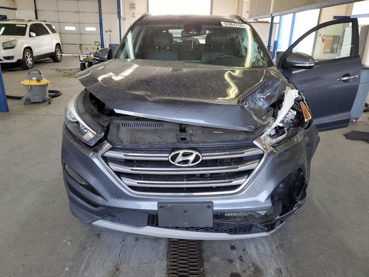 2018 Hyundai Tucson Value VIN: KM8J3CA22JU777993 Lot: 63847554