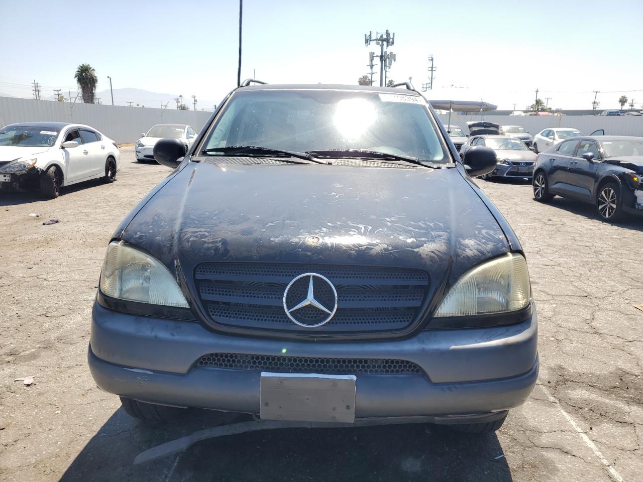 1999 Mercedes-Benz Ml 320 VIN: 4JGAB54E0XA139479 Lot: 61498394