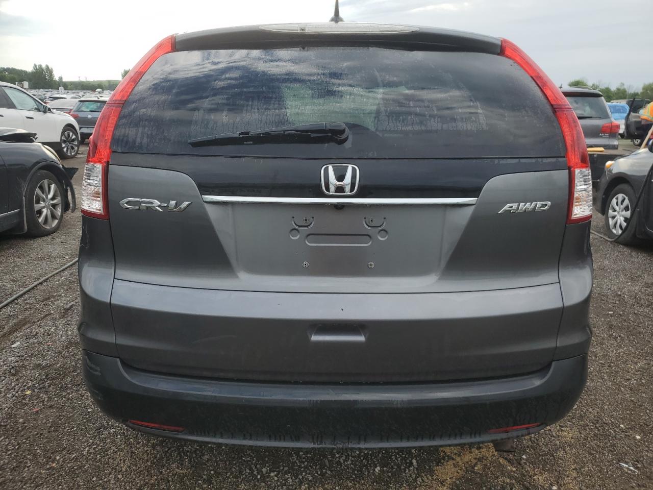 2012 Honda Cr-V Exl VIN: 2HKRM4H79CH103638 Lot: 62817024