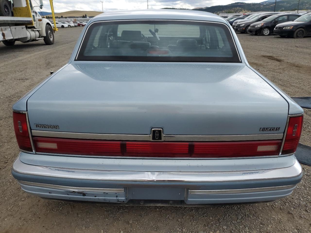 1990 Lincoln Town Car Signature VIN: 1LNLM82F6LY647523 Lot: 65439964