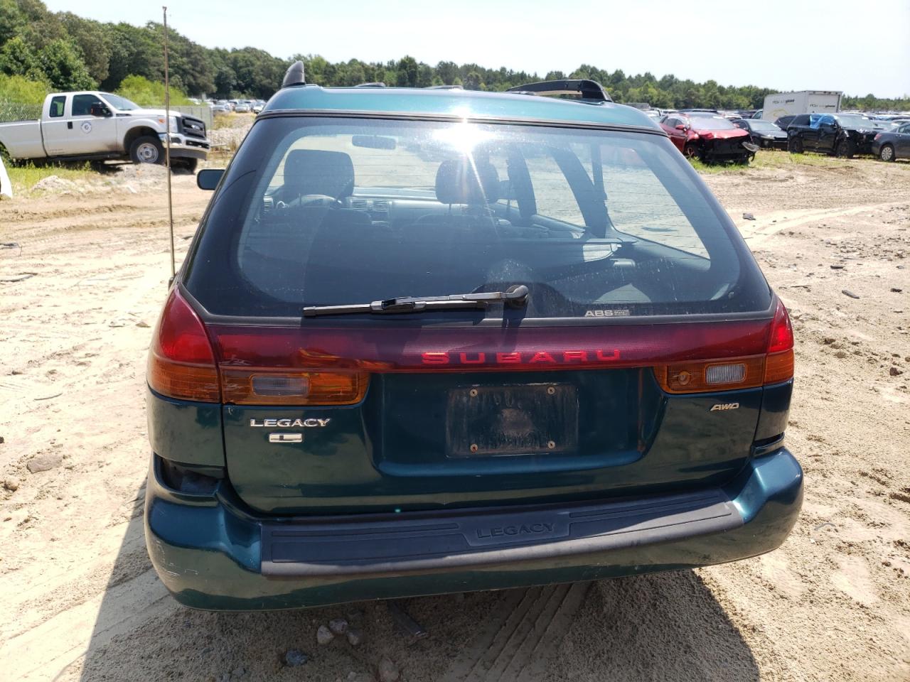 1999 Subaru Legacy L VIN: 4S3BK4356X7305909 Lot: 63951894