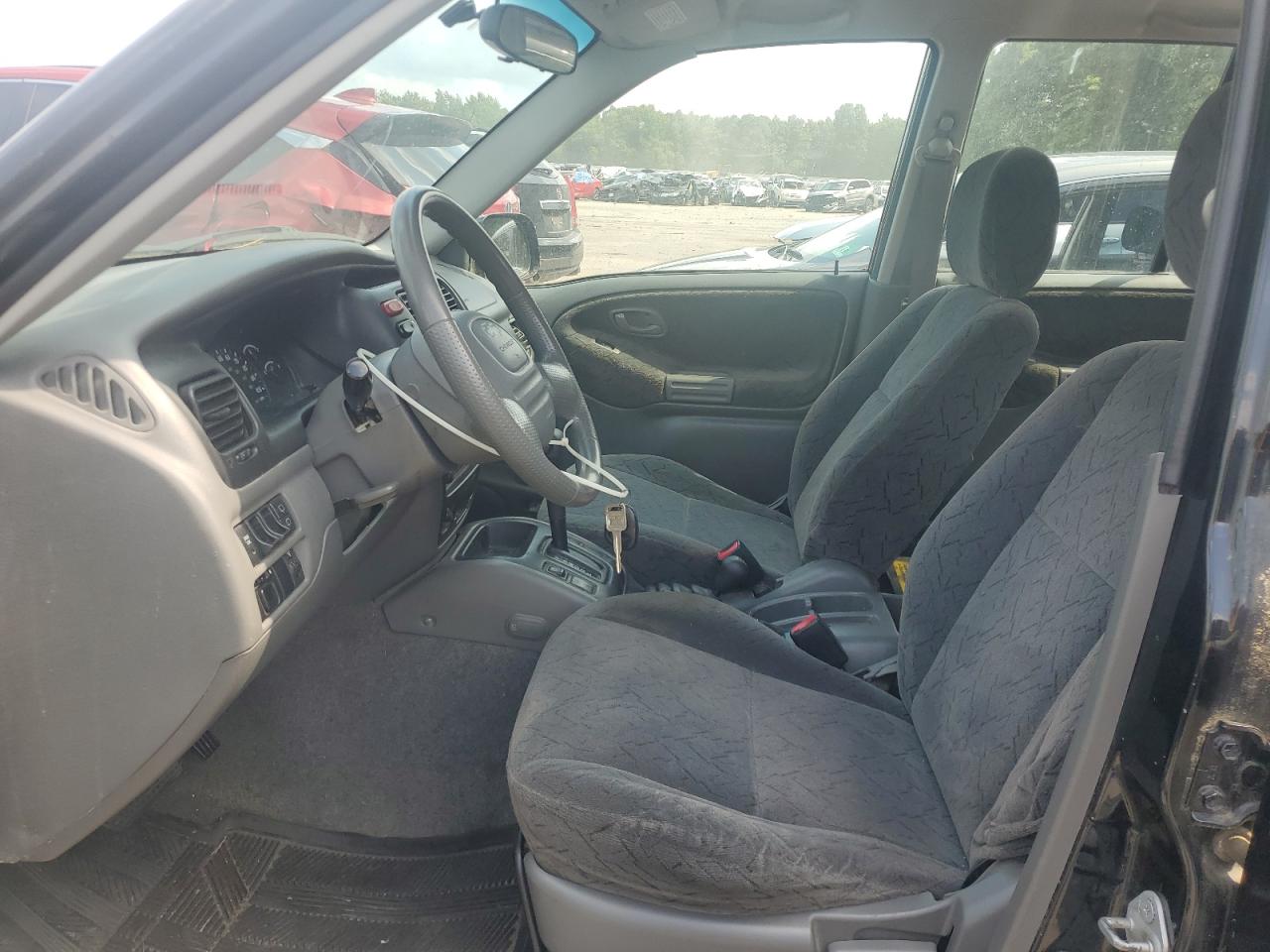 2001 Chevrolet Tracker Lt VIN: 2CNBJ634216947200 Lot: 64944254