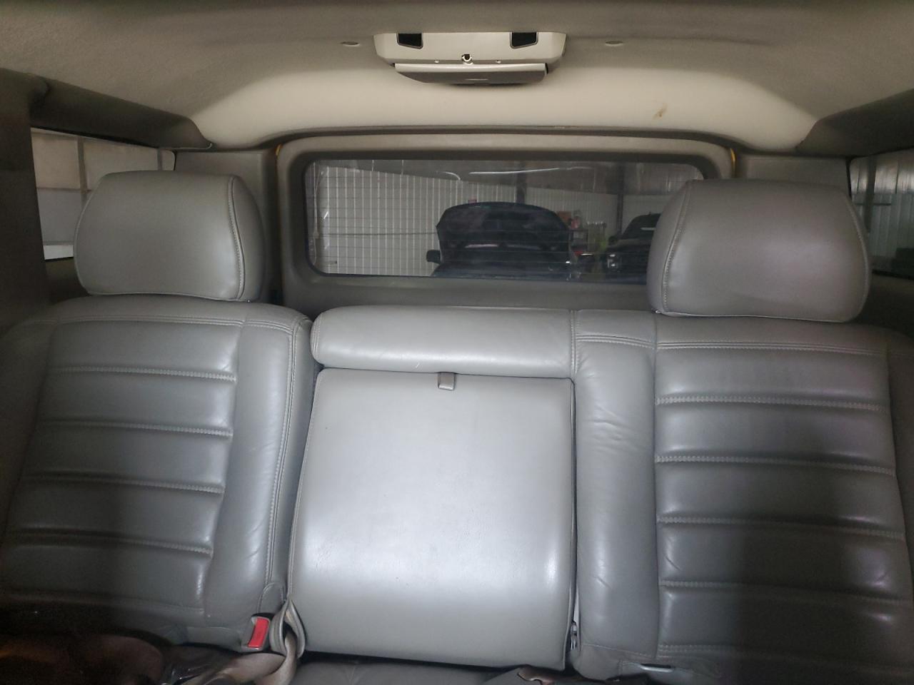 2003 Hummer H2 VIN: 5GRGN23U33H128327 Lot: 62786604