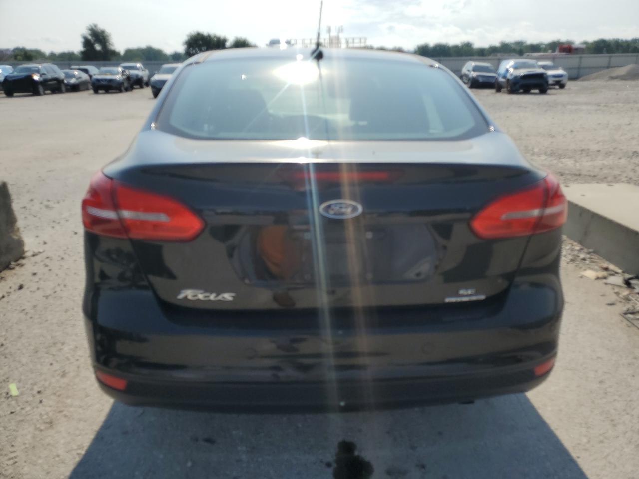 2016 Ford Focus Se VIN: 1FADP3F26GL361318 Lot: 62988534