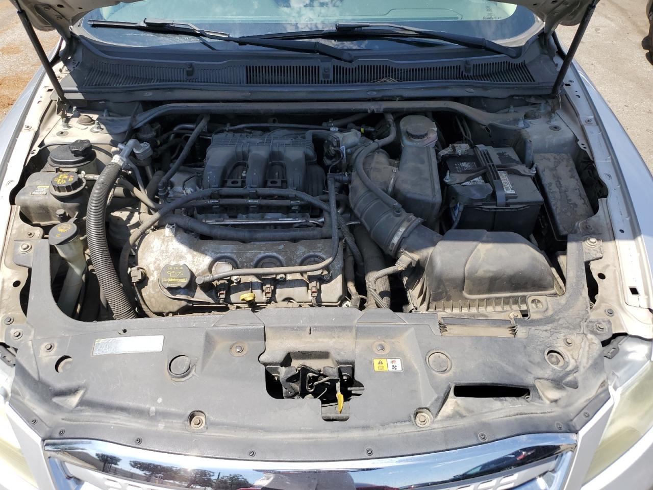 2012 Ford Taurus Se VIN: 1FAHP2DWXCG135660 Lot: 63555974